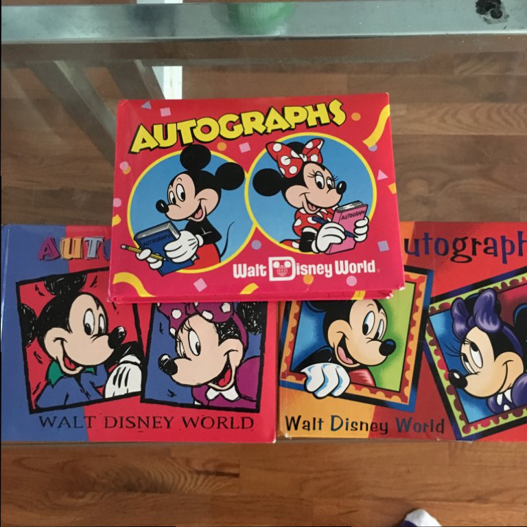 Looking through old Disney Autograph books with Disney character signa