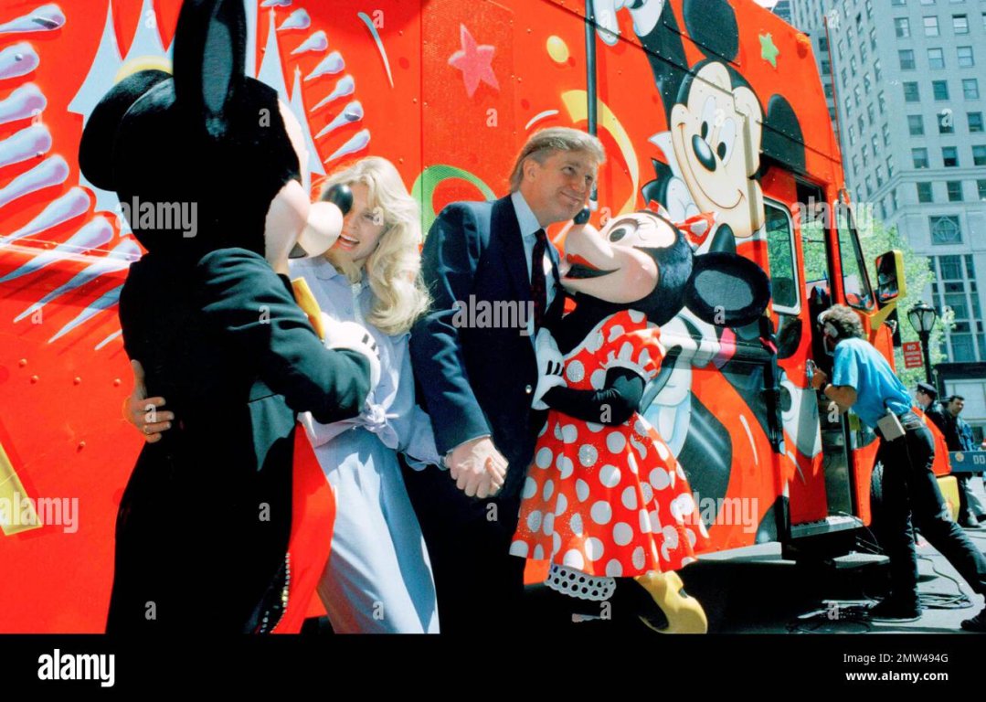real-estate-magnate-donald-trump-and-fiance-marla-maples-greet-mickey-and-minnie-mouse-during-...jpg