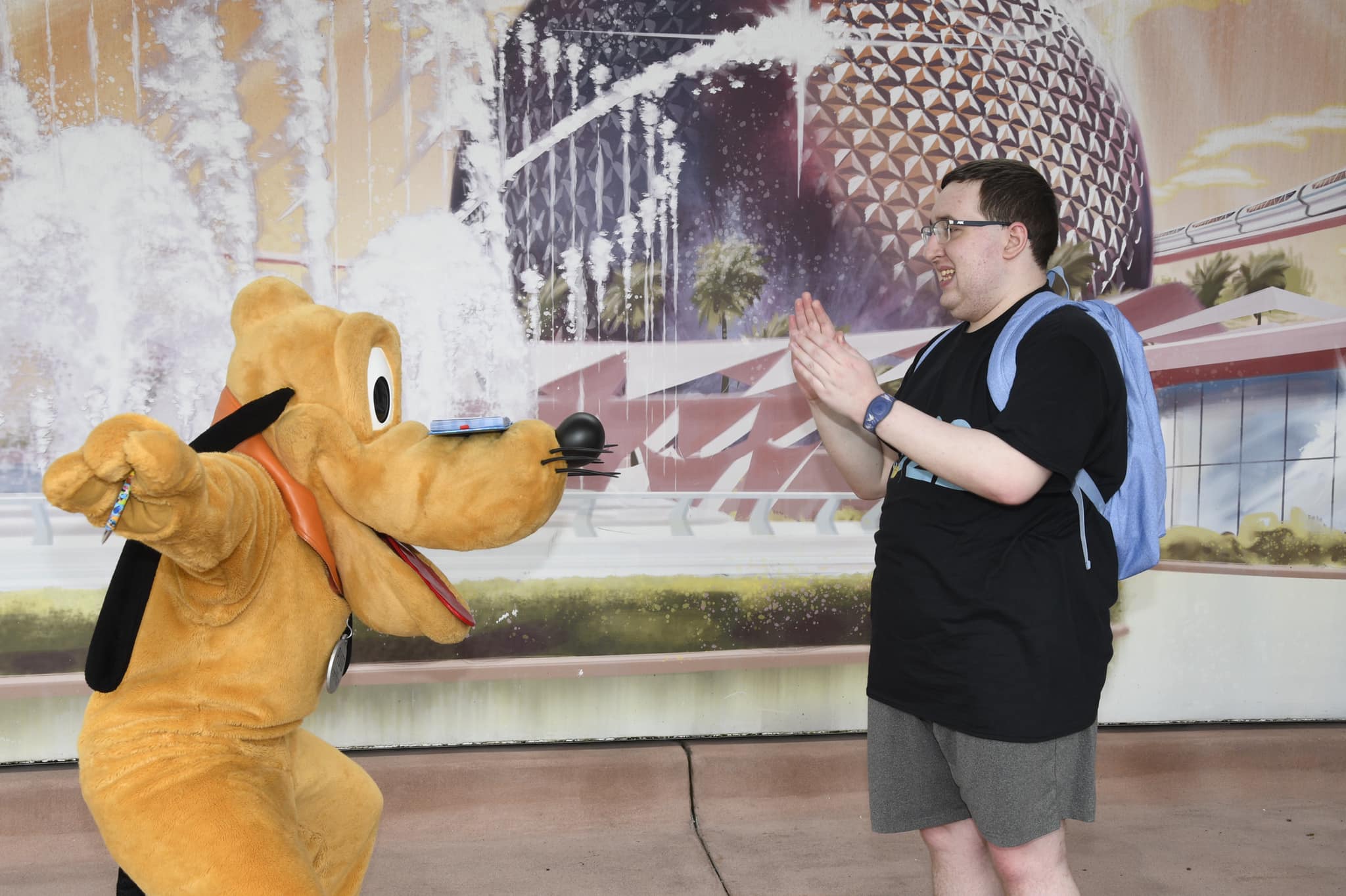 Pluto showing off his tricks