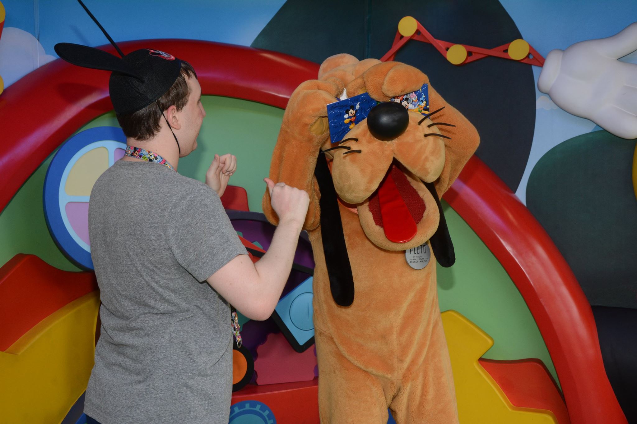 Pluto Signing my Book