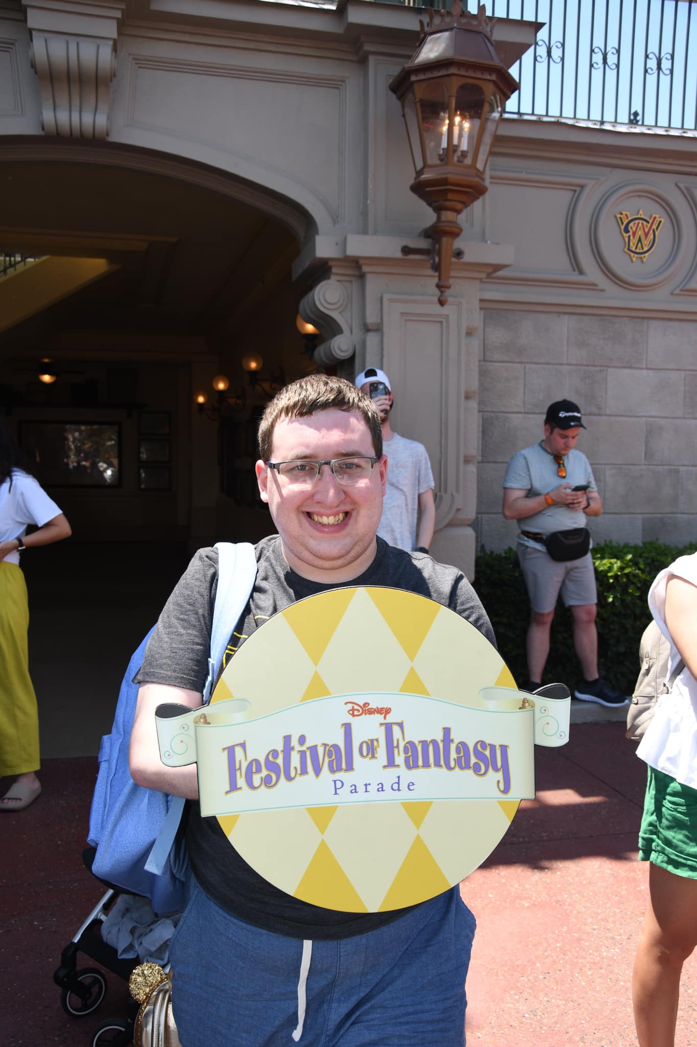 Posing with the Festival of Fantasy sign