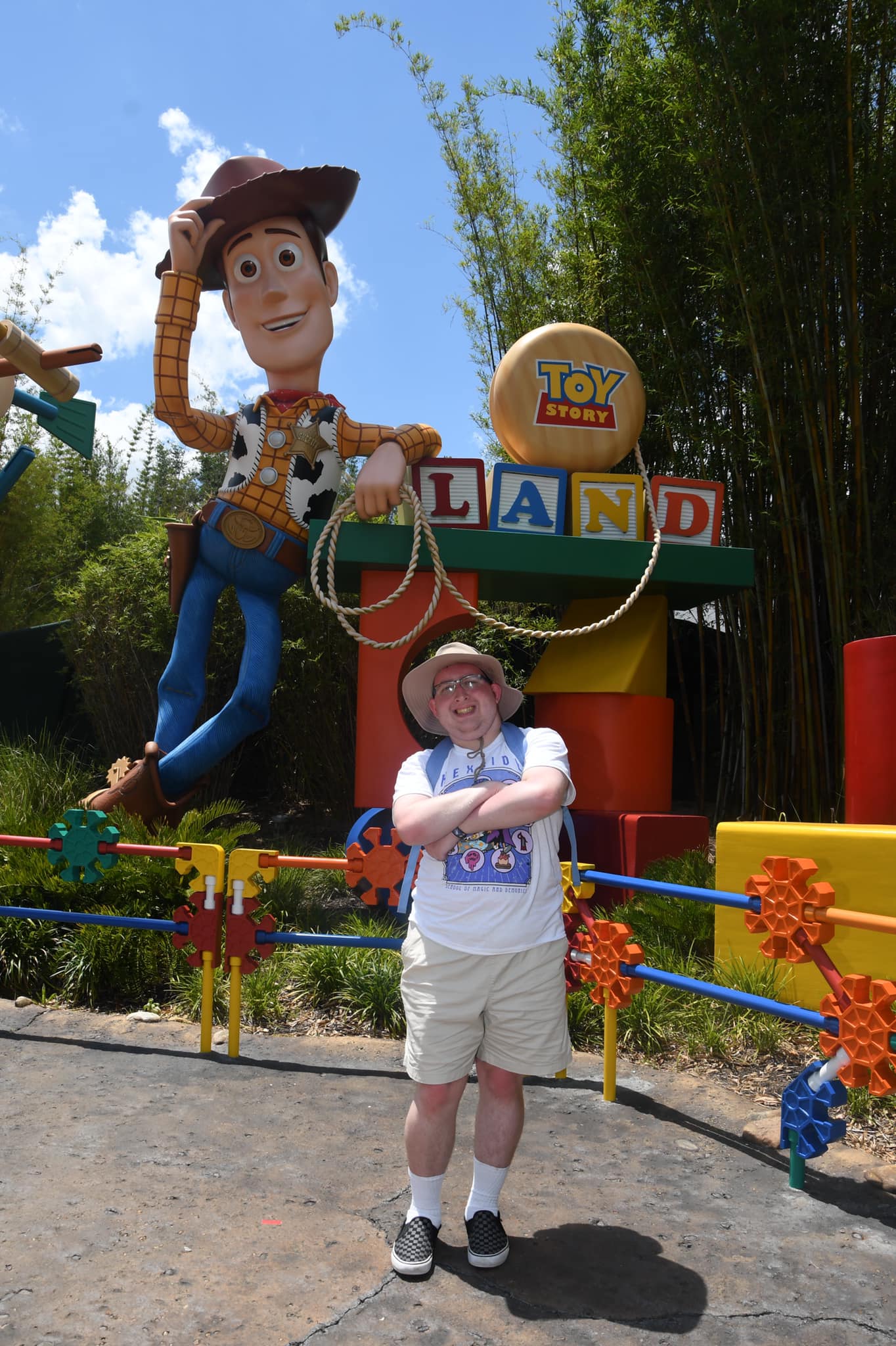 Posing with the Toy Story Land sign